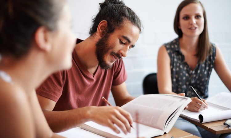 theyre-showing-dedication-education-cropped-shot-young-college-students-class.jpg